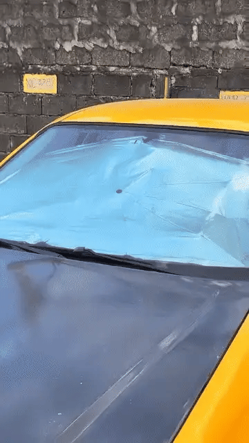 Portable Denx Car Umbrella by My Store, shown protecting a vehicle from sun and rain in a compact, foldable design.shop_this_look_EcLGgQ