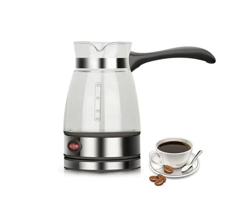 Electric water kettle by ZK, made of stainless steel with a black handle and lid, boiling water on a kitchen countertop.